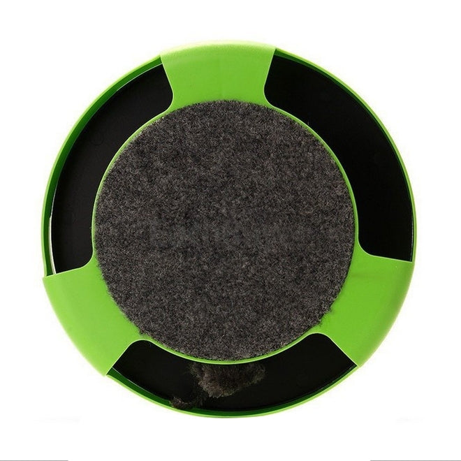 Round green cat turntable base with black openings and gray felt center.