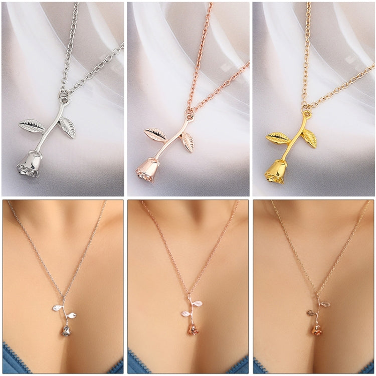 Rose pendant necklace with branching floral charms shown in silver, rose gold, and gold tones