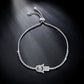Silver hamsa hand crystal inlaid bracelet with rhinestone charm detail