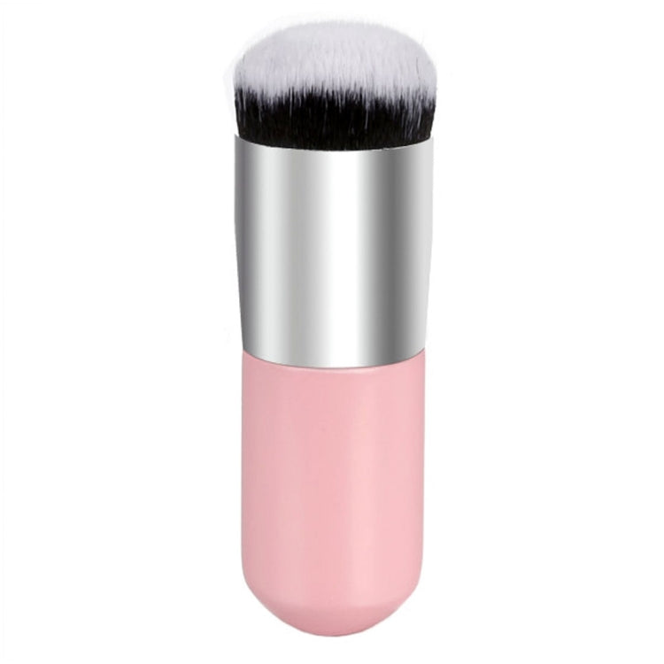 Large round makeup brush with pink-toned handle, silver base band, soft bristles