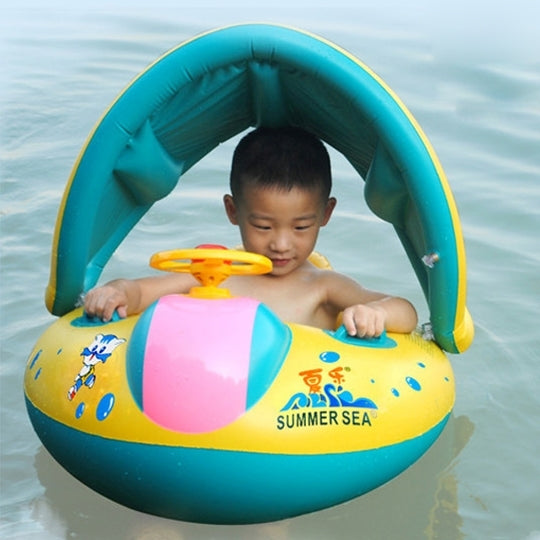 Inflatable baby boat seat on water with teal canopy and yellow-blue ring base