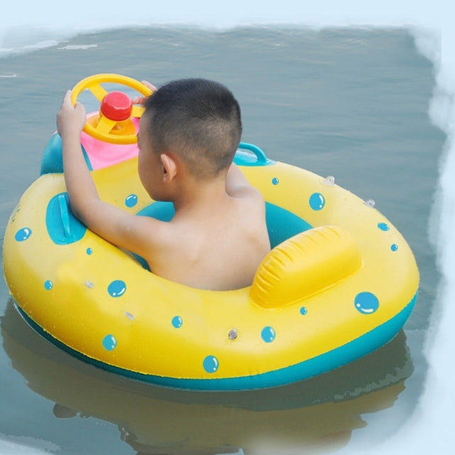 Inflatable boat ring with teal canopy, yellow ring body, and pink steering wheel