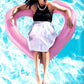 Pink heart-shaped inflatable pool safety ring floating around a person