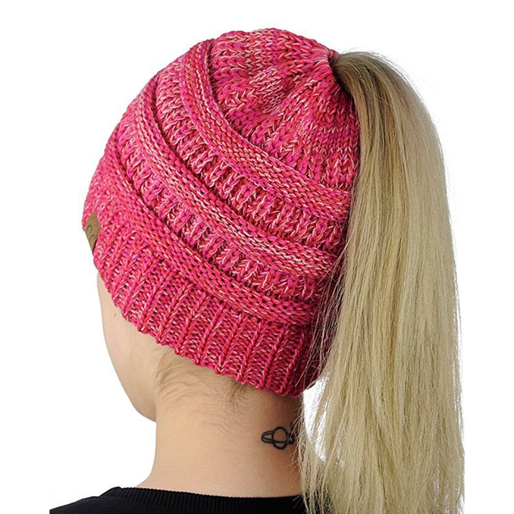 Magenta knit ponytail cap beanie, side view with open back for a ponytail