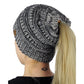 Black-and-grey marled knitted ponytail cap beanie with ribbed band