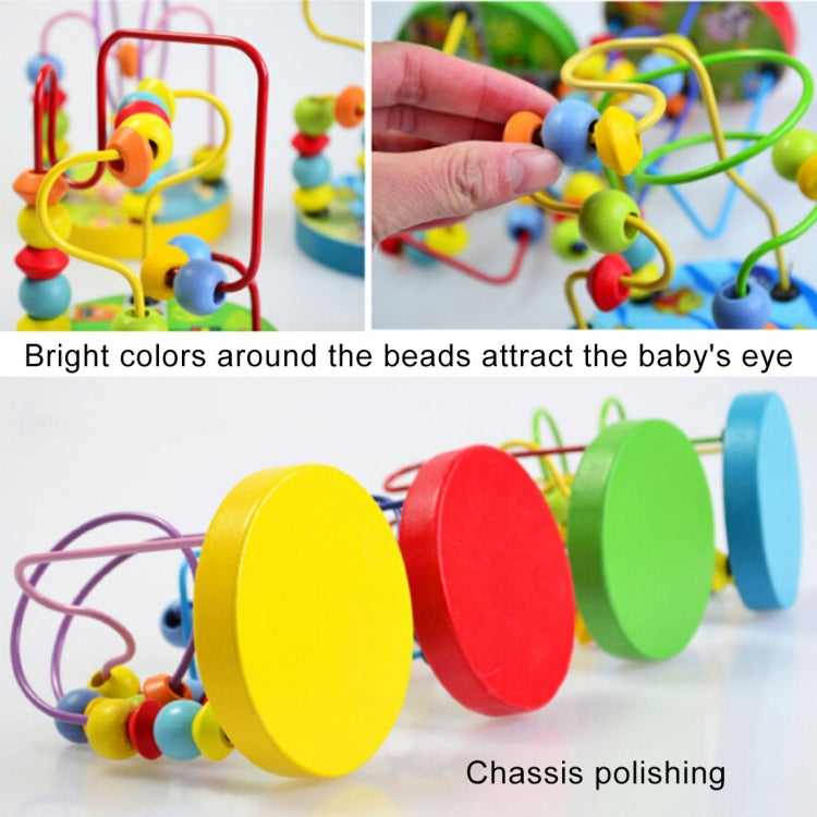 Close-up of colorful wooden bead maze with hand holding a green and blue bead