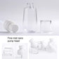 Clear plastic spray bottle with white cap and pump head, plus empty travel container