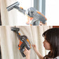 Vacuum brush head attachment cleaning curtains, grey with orange accents
