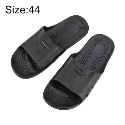 Black six-hole anti-slip slide slippers with textured footbed and side cutouts