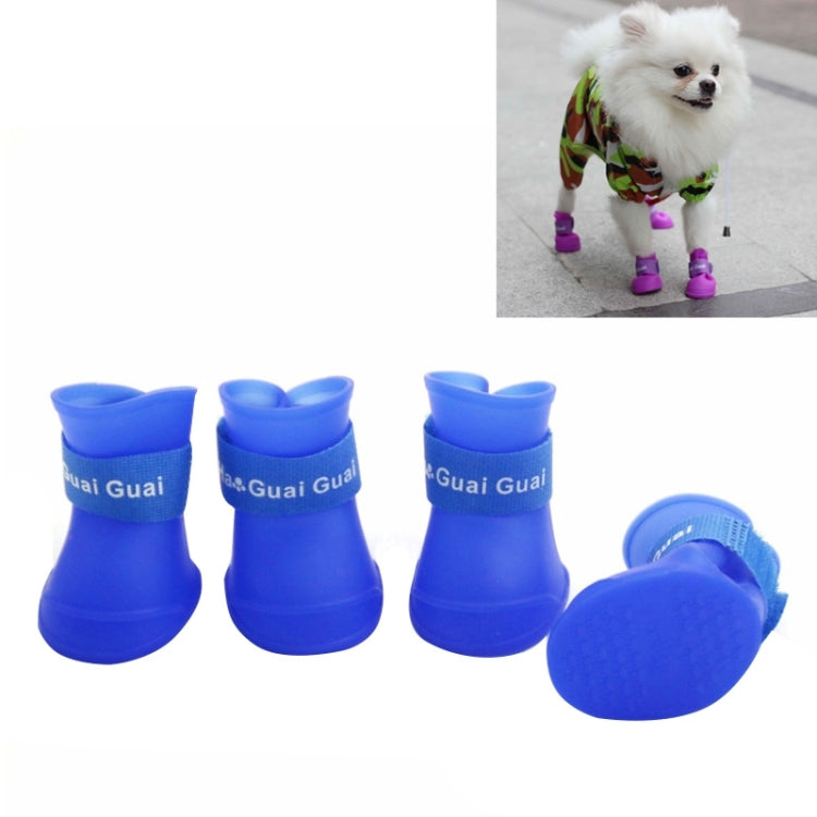 Blue rubber dog rain boots set with grippy textured sole