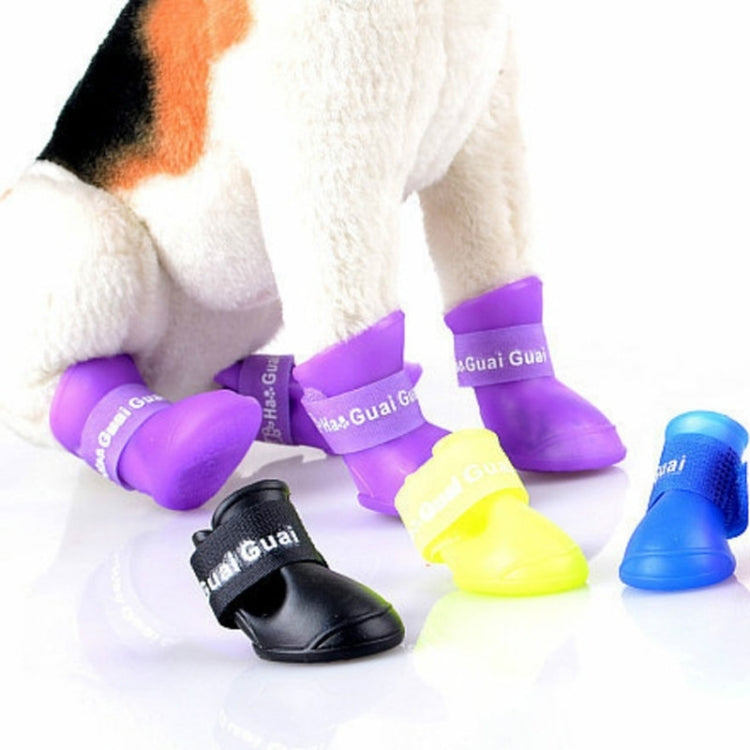 Colorful rubber dog rain boots: purple, yellow, black and blue pairs