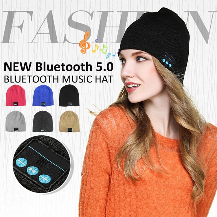 Black knitted beanie with Bluetooth control panel patch, shown on a model.