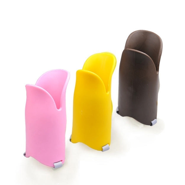 Pink, yellow, and dark brown silicone duck-mouth muzzles with gray straps
