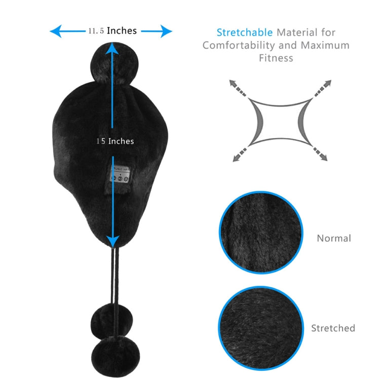 Black plush ear-muff hat with pom-poms and small control panel; stretchable fabric design