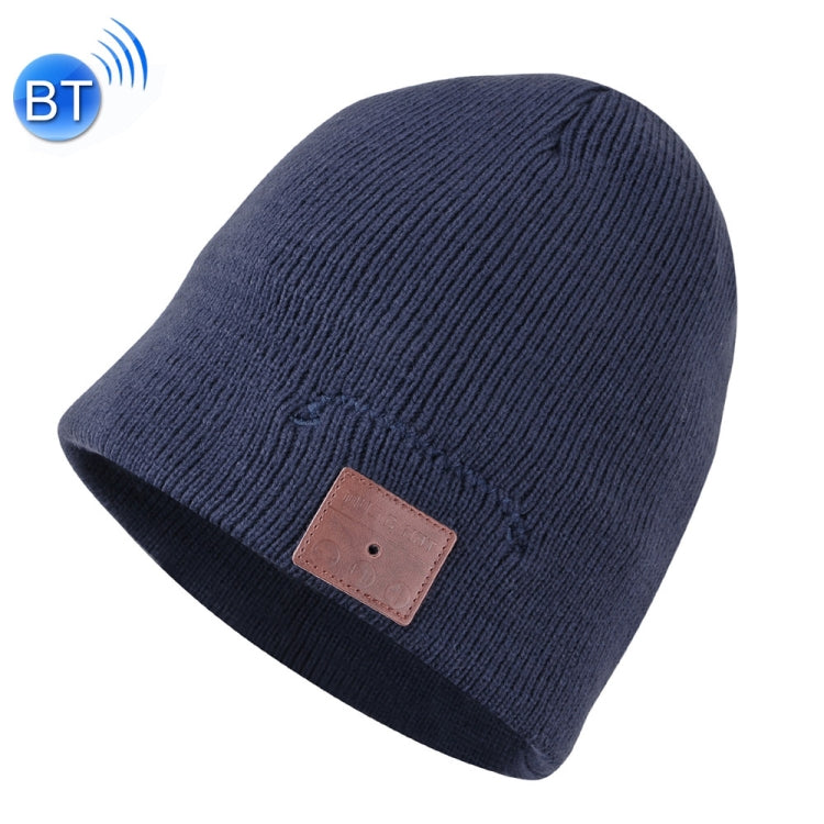 Navy blue knit beanie with brown control patch on front