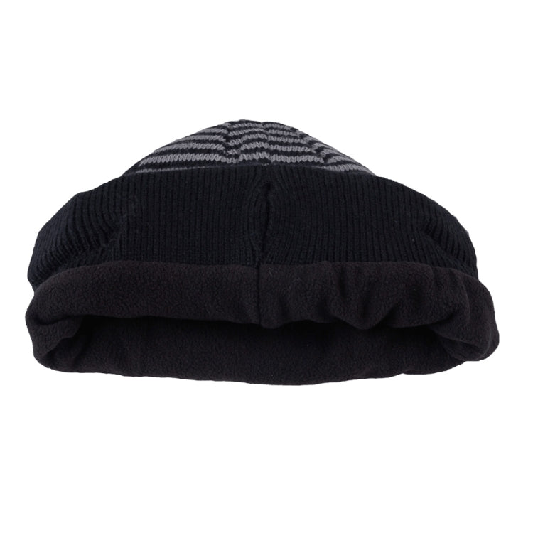 Black knit beanie with ribbed fold-over cuff, striped panel on top