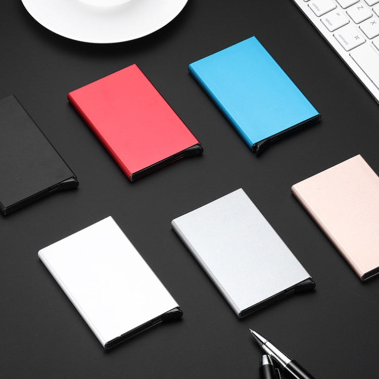 Assorted slim card holders in black, white, red, blue, and tan