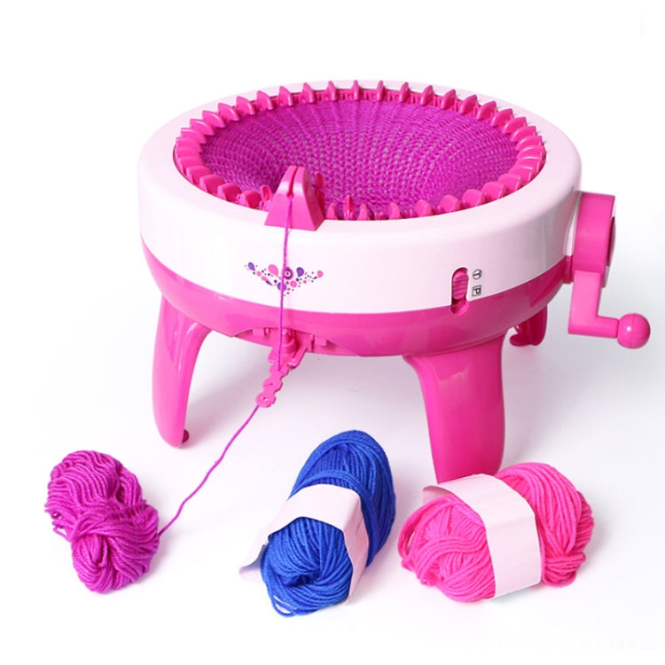 Kids knitting machine toy with pink circular spool and three yarn balls