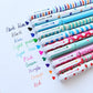 Bundle of pastel 0.5mm gel pens with striped patterns and multicolor tips