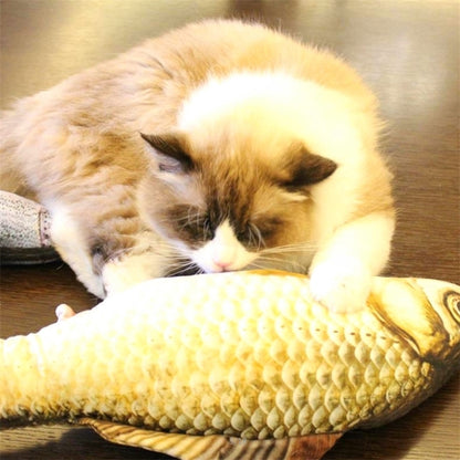 Fish-shaped cat scratching toy with plush yellow scales and dark tail