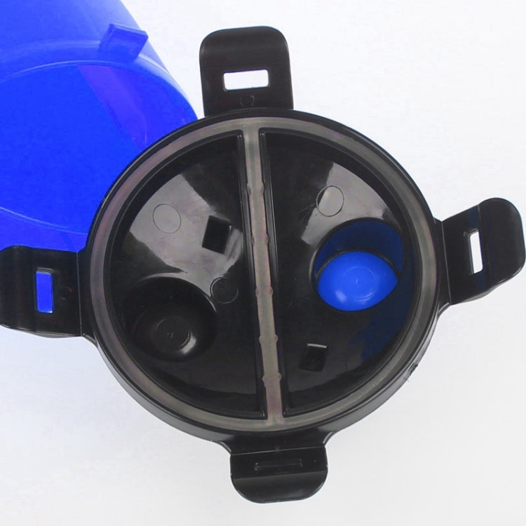 Top view of blue and black portable pet water cup with folding bowl divider