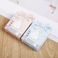 Disposable cotton makeup facial pads in pastel carton box packaging