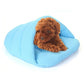 Slipper-shaped fleece pet house bed, size L, light blue, with dog resting inside