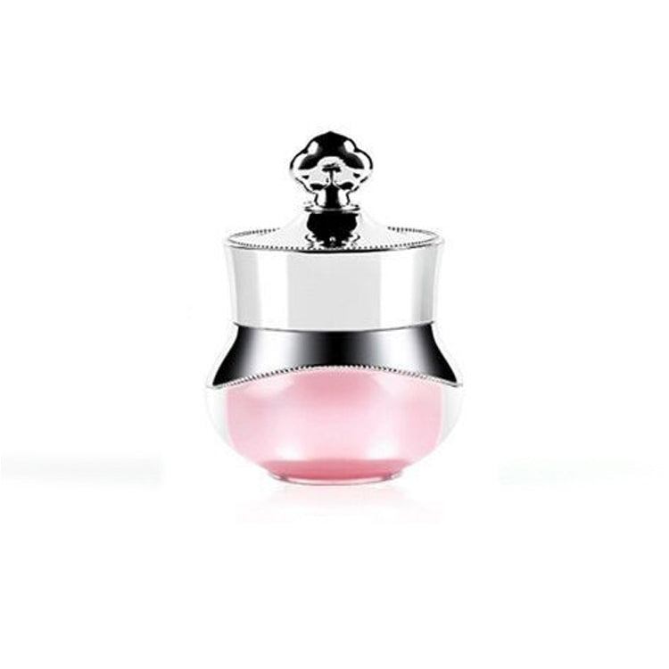 Silver travel container with pink acrylic base and hard sealed lid