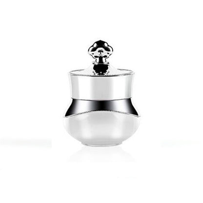 Silver travel container with clear acrylic body and hard sealed lid