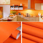 Orange PVC brick-style wallpaper roll, glossy finish for waterproof wall decor