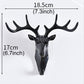Dark deer head wall hook, 18.5 cm wide and 17 cm tall