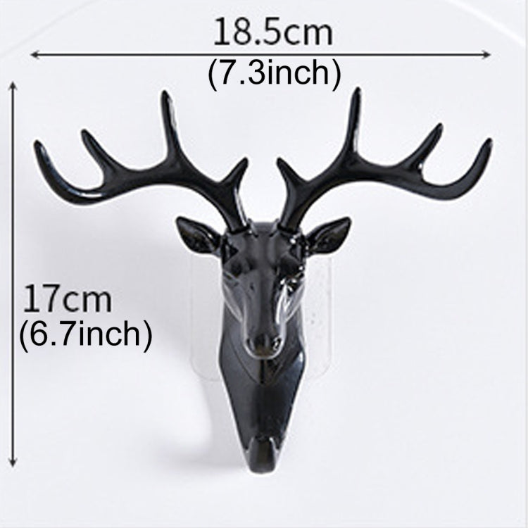 Dark deer head wall hook, 18.5 cm wide and 17 cm tall