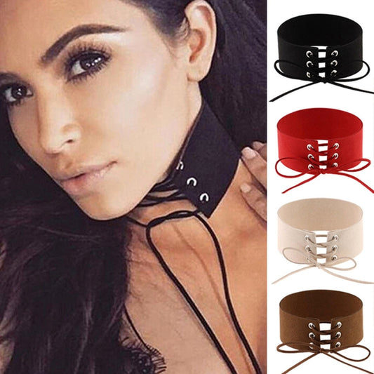 Velvet lace-up choker with grommets, black punk-style collar necklace worn on model