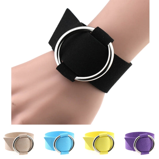 Black velvet round wrist bracelet with silver-tone metal ring and hook strap.