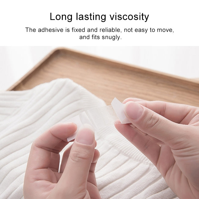 Peeling clear adhesive strips from a backing sheet over ribbed fabric