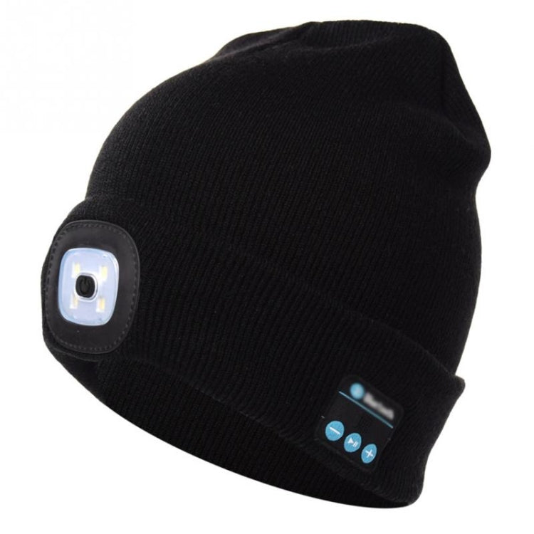 Black knit beanie, side view, LED module and blue control buttons