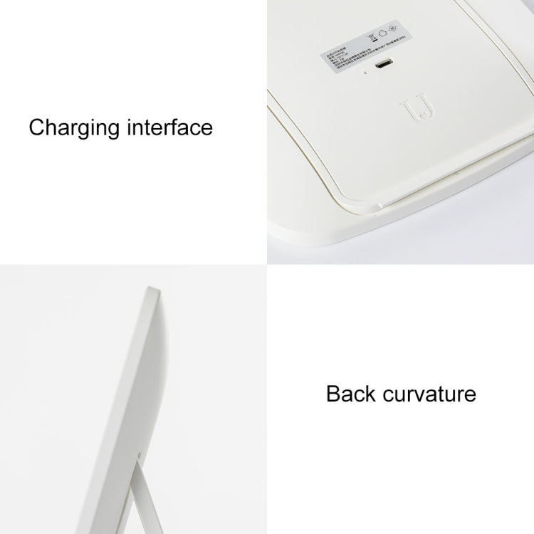 White desktop LED mirror showing charging interface and curved back design