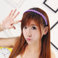 Twist braid hair headband with light purple braided band, worn on top of hair