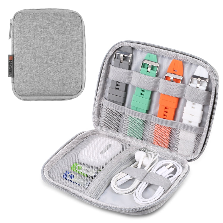 Grey watch band organizer storage case with zip-top and open compartments for cables and bands