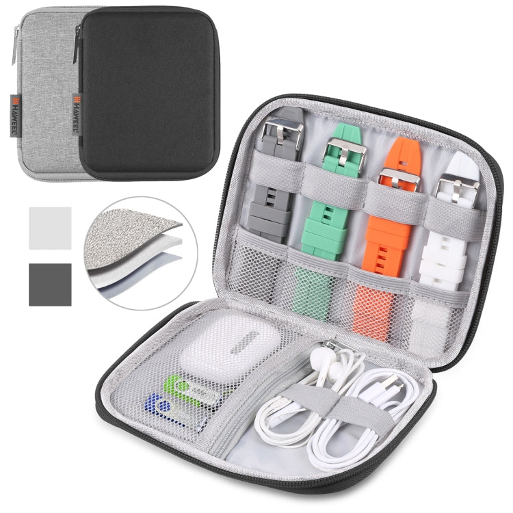 Grey watch band organizer case with open organizer and mesh-lined pockets for cables and bands