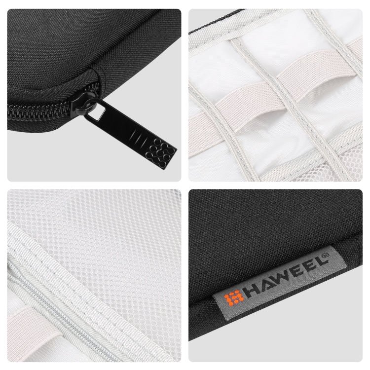 Black watch band organizer case details: zipper pull, Oxford fabric, and HAWEEL label