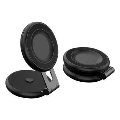 Black magnetic car phone bracket with circular mount and adjustable stand