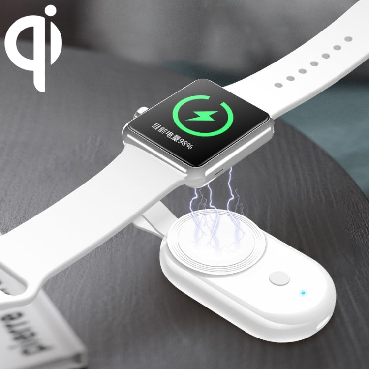 Magnetic wireless charger for Apple Watch on white strap with green charging icon