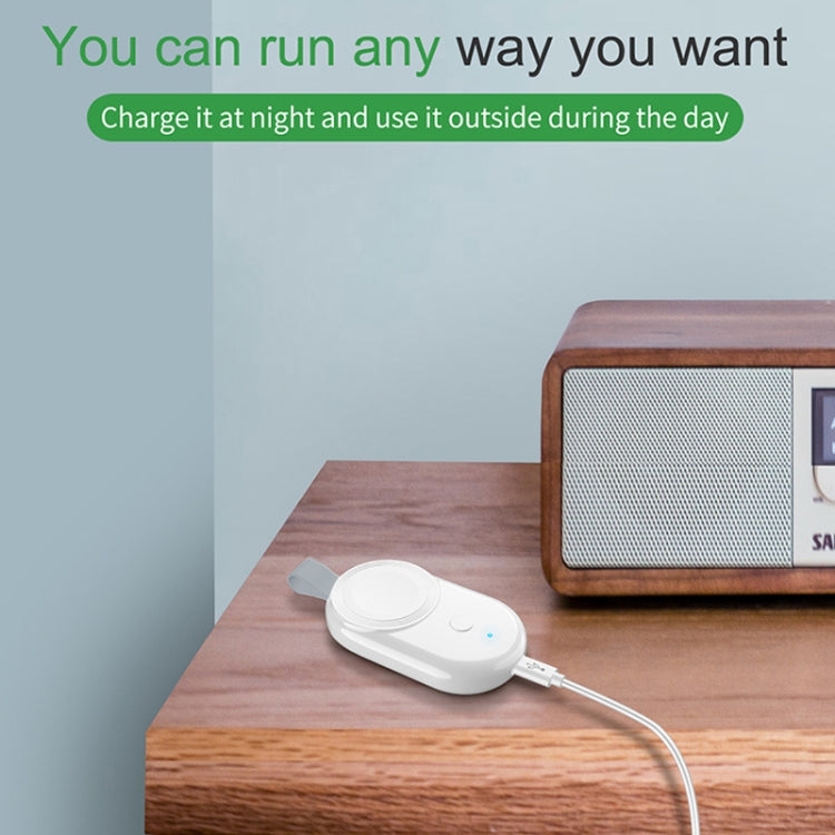 White wireless watch charger dock with cable connected and blue indicator light