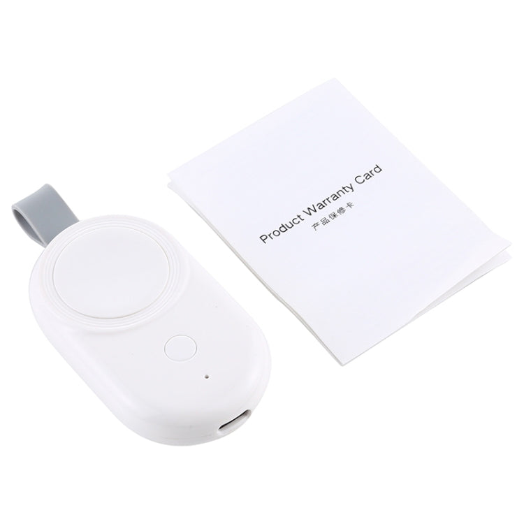 White wireless charger for Apple Watch with gray loop and included product warranty card