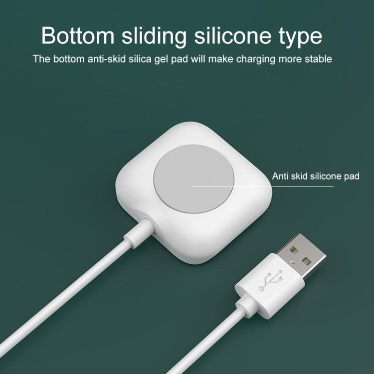 White magnetic charging base with anti-slip silicone pad and USB charging cable