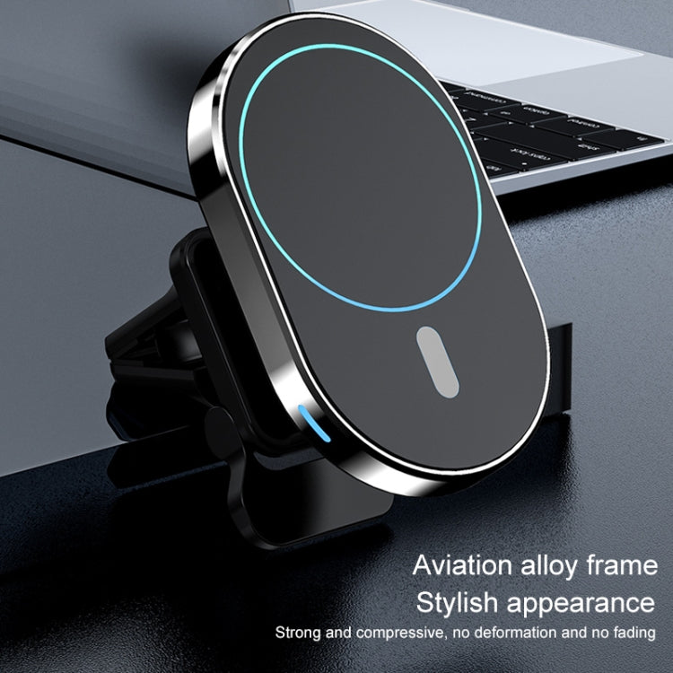 Magnetic car wireless charger bracket with black housing and blue charging ring on vent