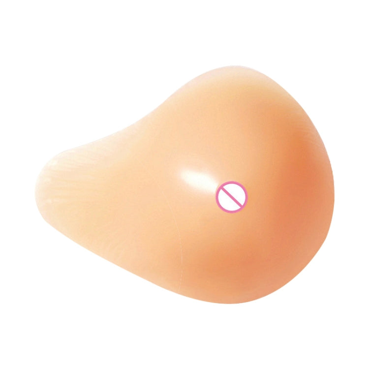 Right silicone breast pad, smooth peach teardrop form with nipple marking