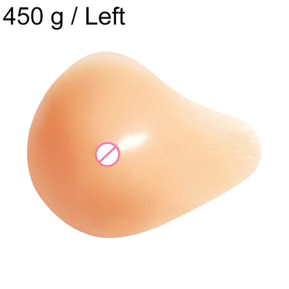 Left silicone breast pad with smooth light peach spiral-shape surface and nipple cover mark