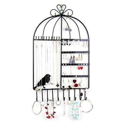 Black birdcage jewelry display rack with hooks, earring holes, and necklace strands